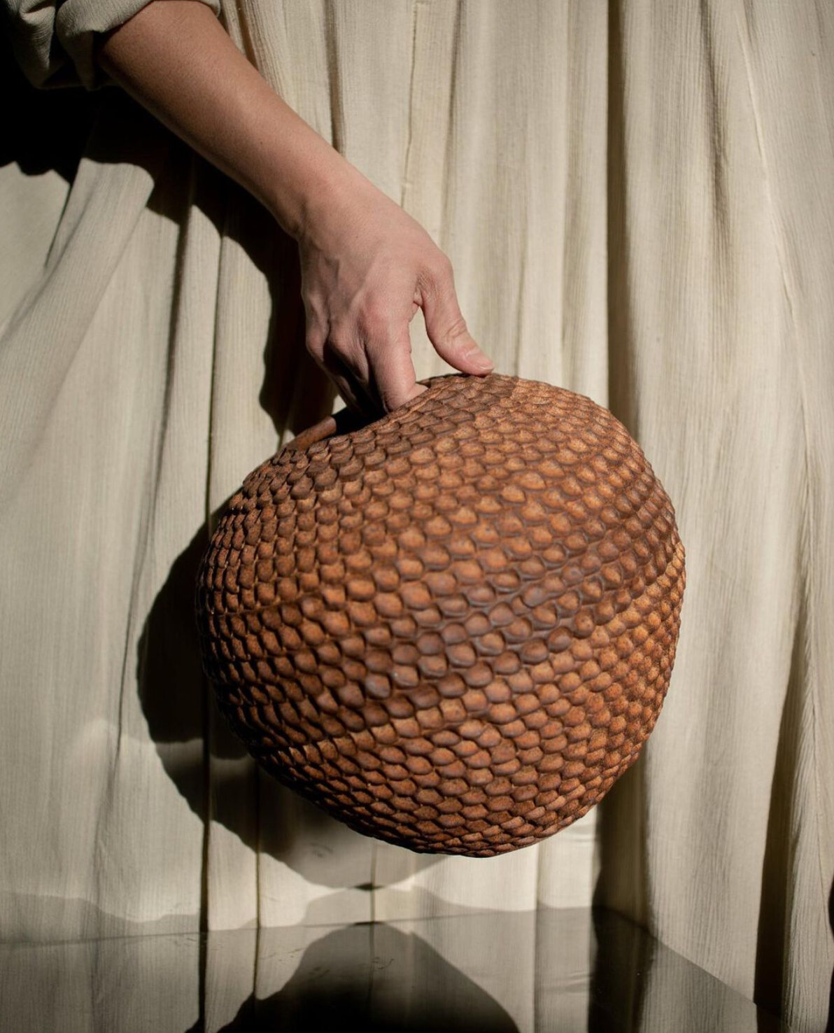 On the first collection of coil pots she posted for sale on her website (katherinemoes.com), Katherine used her finger to create the surface pattern. More recently she has been experimenting with making and using custom clay stamps to make various patterns. Photo credit: James Moes